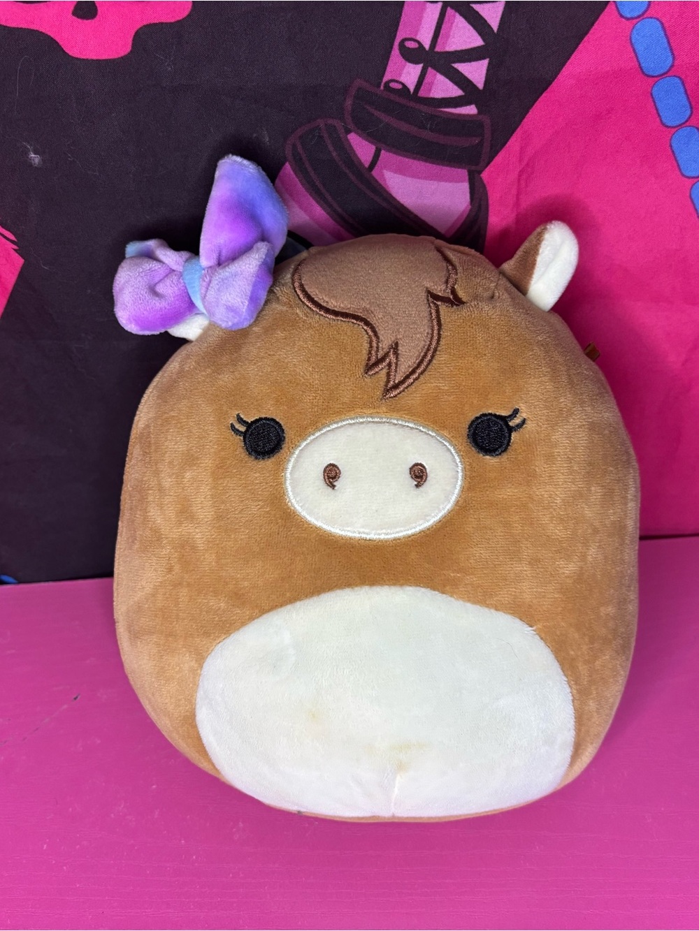 Tomar The Horse With Purple Tie-Dye Bow